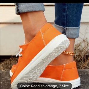 Orange canvas women’s shoes brand new 7.5